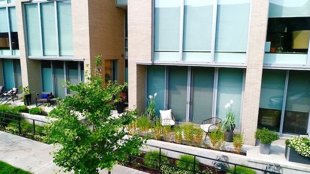 2813 Brush St Unit 99, Detroit, MI 48201 - view of home's exterior with brick siding