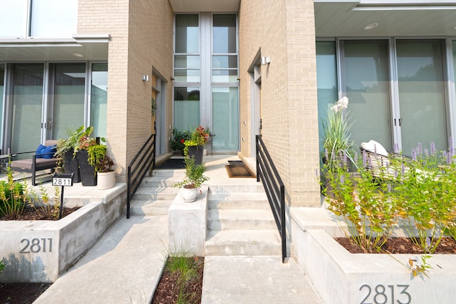 2813 Brush St Unit 99, Detroit, MI 48201 - view of exterior entry featuring brick siding