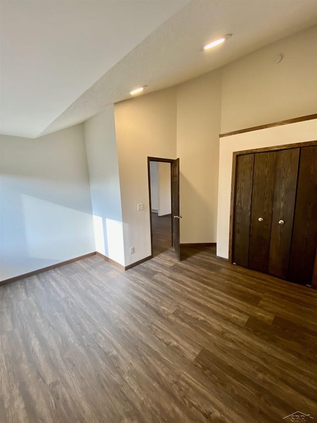 3879 Kochville Rd, Saginaw, MI 48604 - unfurnished bedroom featuring wood finished floors and baseboards