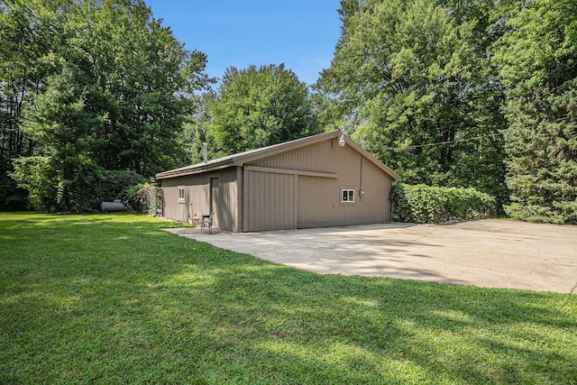 garage featuring a yard