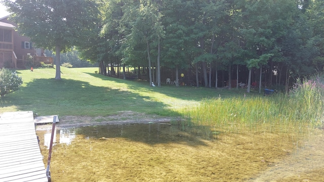 view of yard with a water view