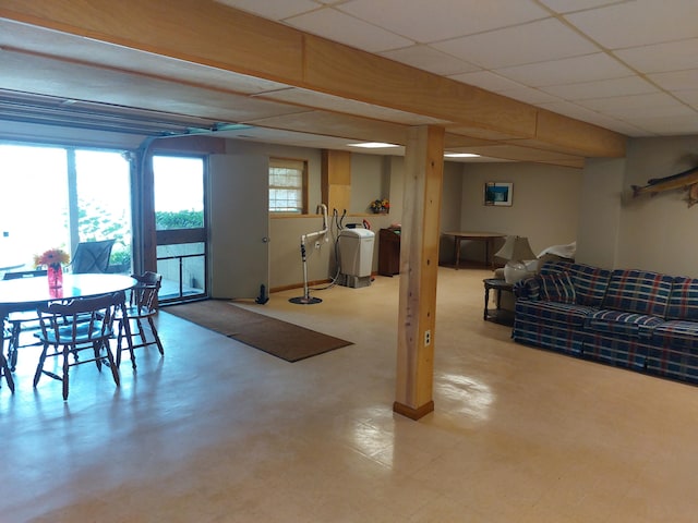 dining room with a drop ceiling