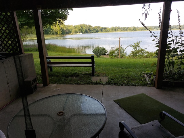 view of patio / terrace with a water view