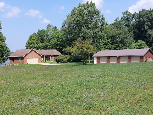 view of yard with a garage