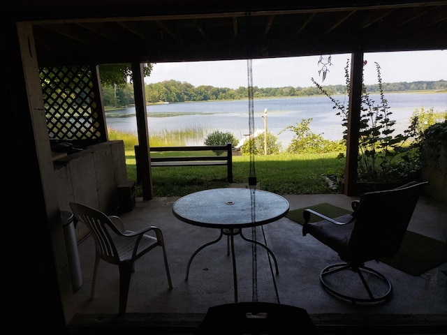 view of patio / terrace with a water view