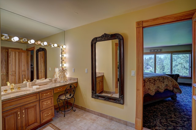 bathroom featuring tile patterned floors and vanity