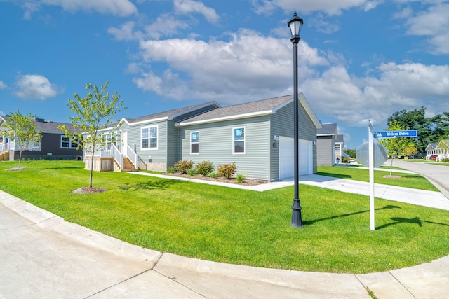 2776 Pinellas Ct, Lapeer, MI 48446 - view of front facade with driveway, a front yard, a garage, and stairs