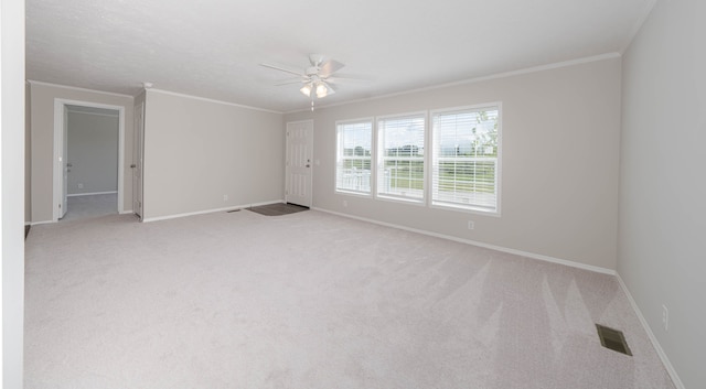 2776 Pinellas Ct, Lapeer, MI 48446 - empty room with ceiling fan, light colored carpet, baseboards, and ornamental molding