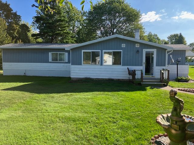 7377 Birch Dr, Port Hope, MI 48468 - view of front of home featuring a front yard