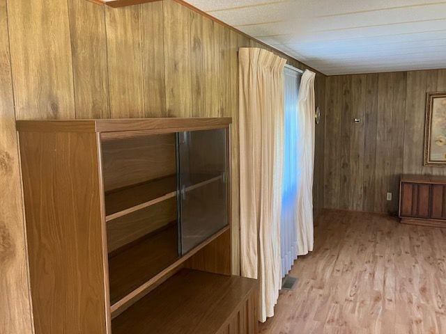 7377 Birch Dr, Port Hope, MI 48468 - interior space with wood walls and wood finished floors