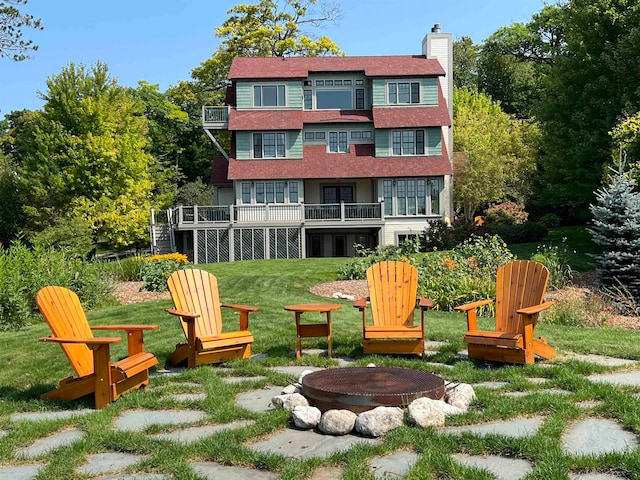 exterior space with a fire pit