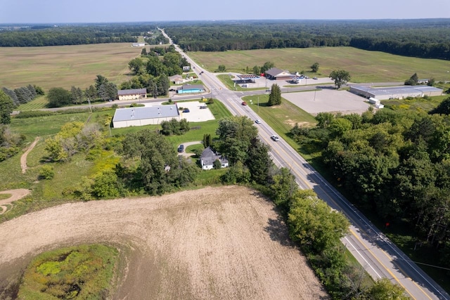 birds eye view of property featuring a rural view