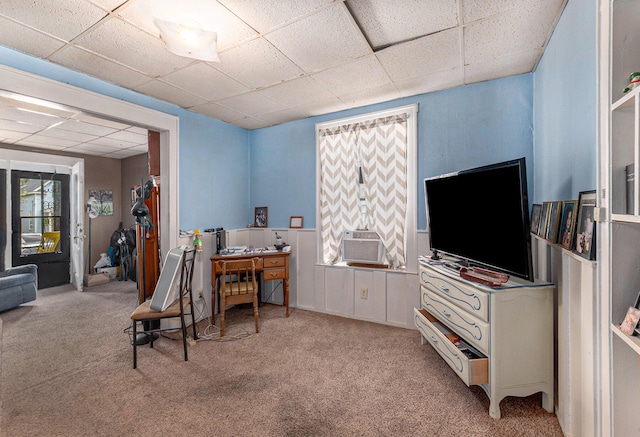 carpeted office space featuring a drop ceiling and cooling unit