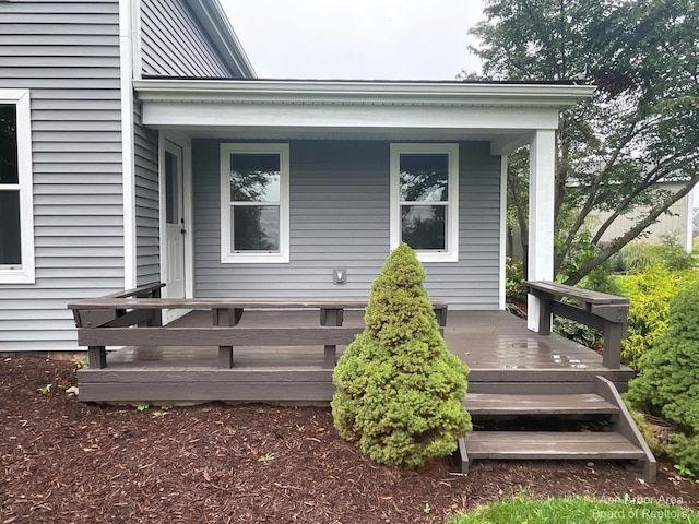 entrance to property with covered porch