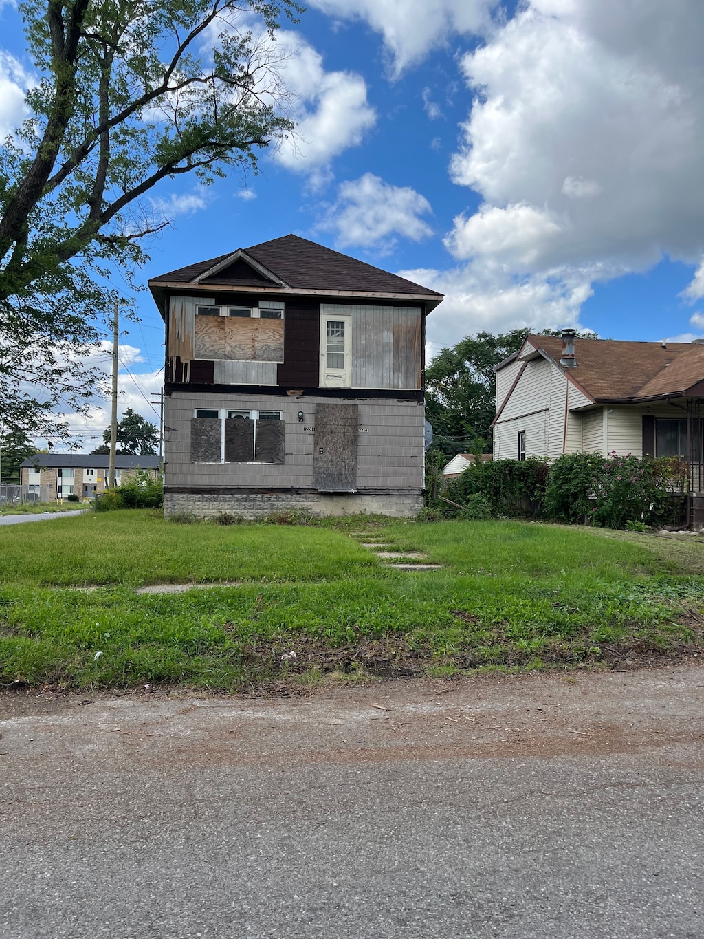 view of home's exterior with a yard