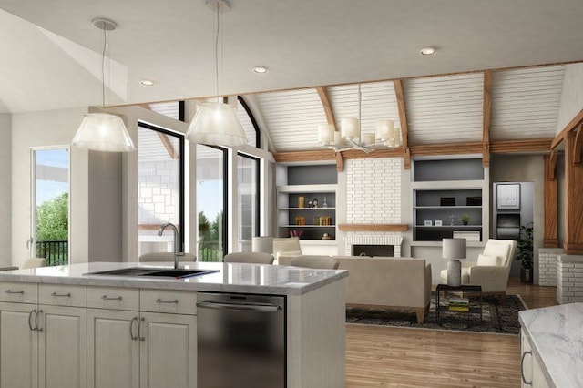 66930 Dorothy Trl, Washington, MI 48095 - kitchen with a chandelier, a sink, dishwasher, light wood-style floors, and a fireplace