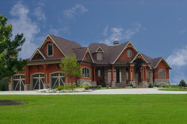 66930 Dorothy Trl, Washington, MI 48095 - craftsman inspired home featuring stone siding, a front lawn, a chimney, and driveway
