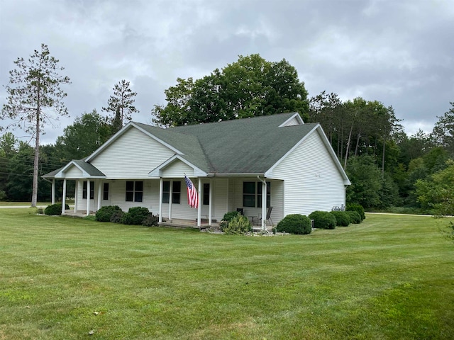 view of front of house featuring a front lawn and a porch