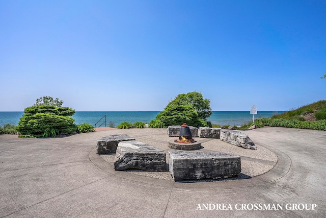 view of patio / terrace featuring a water view