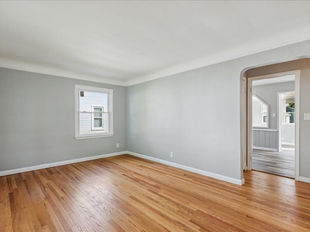 spare room featuring light hardwood / wood-style floors