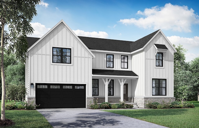 modern farmhouse style home featuring a front lawn and a garage