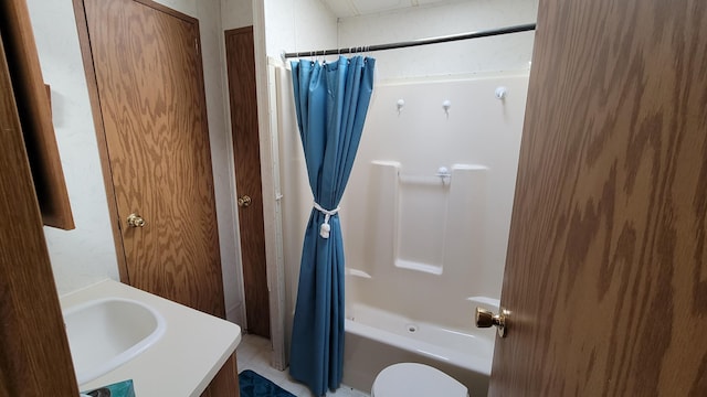 full bathroom with vanity, shower / bathtub combination with curtain, and toilet