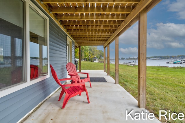 view of patio / terrace featuring a water view