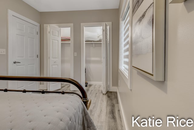 bedroom with light hardwood / wood-style flooring