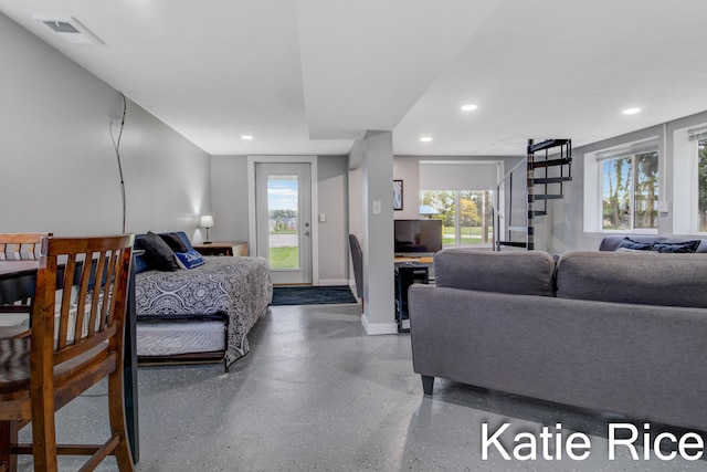 living room featuring plenty of natural light