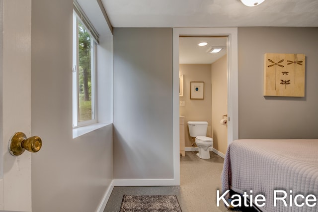 bedroom with connected bathroom