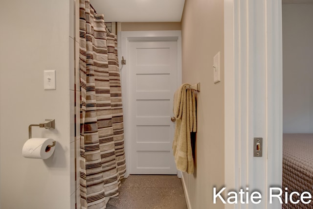 bathroom featuring curtained shower