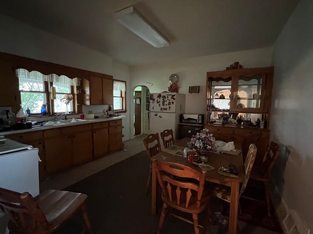 dining room featuring sink