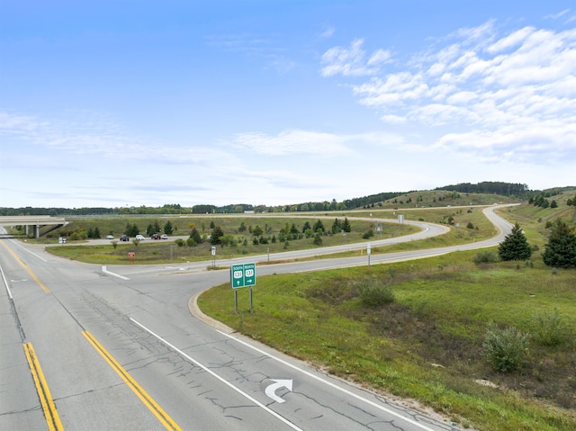 view of road featuring a rural view