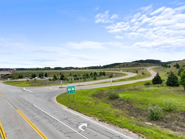 view of road featuring a rural view