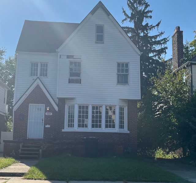 view of property featuring a front yard