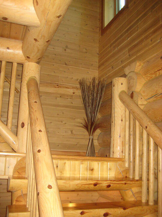 W4231 Wildwood Ln, Moran, MI 49760 - detailed view of log walls