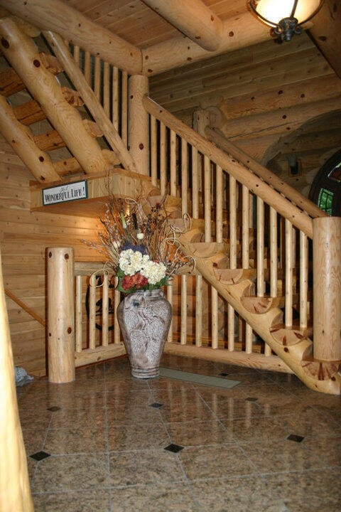 W4231 Wildwood Ln, Moran, MI 49760 - stairs with wooden ceiling and wood walls