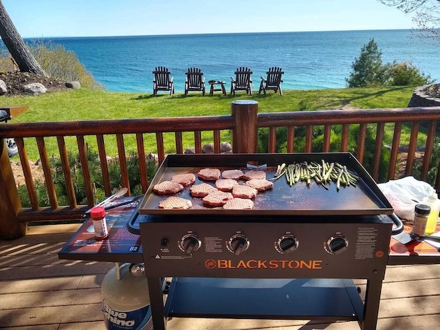 W4231 Wildwood Ln, Moran, MI 49760 - wooden terrace with a water view and area for grilling