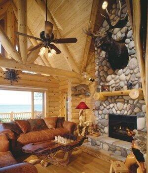 W4231 Wildwood Ln, Moran, MI 49760 - living area with wooden ceiling with exposed beams, wood finished floors, high vaulted ceiling, log walls, and a fireplace