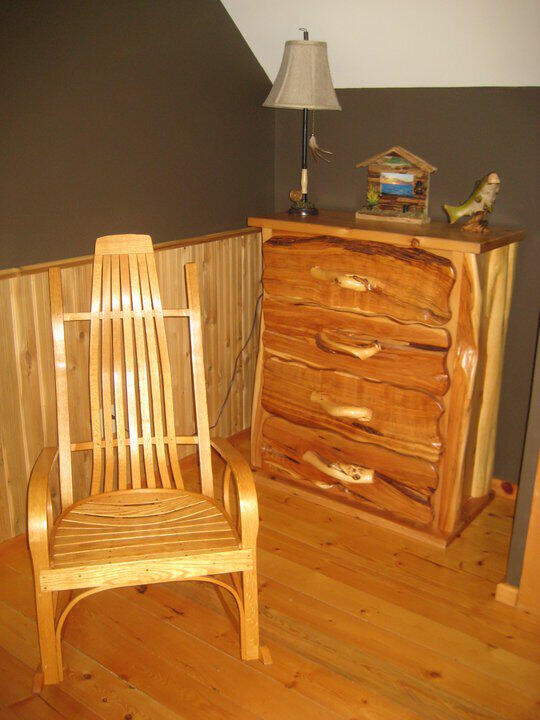 W4231 Wildwood Ln, Moran, MI 49760 - living area featuring wood finished floors