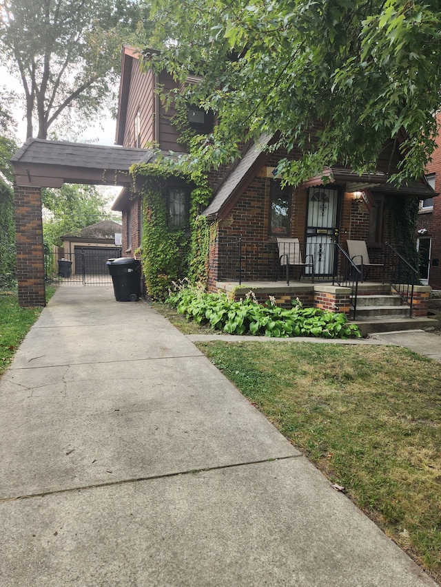 view of side of home with a yard