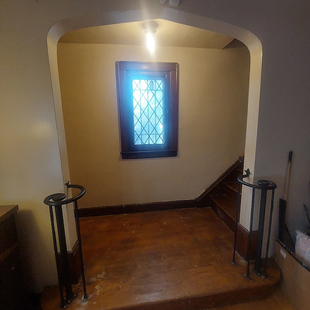 hall featuring dark wood-type flooring