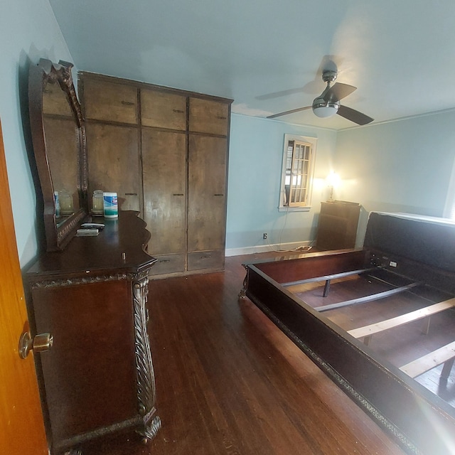 bedroom featuring dark wood-type flooring