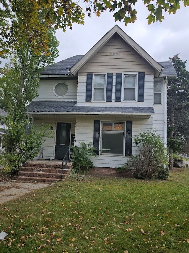 front facade with a front yard