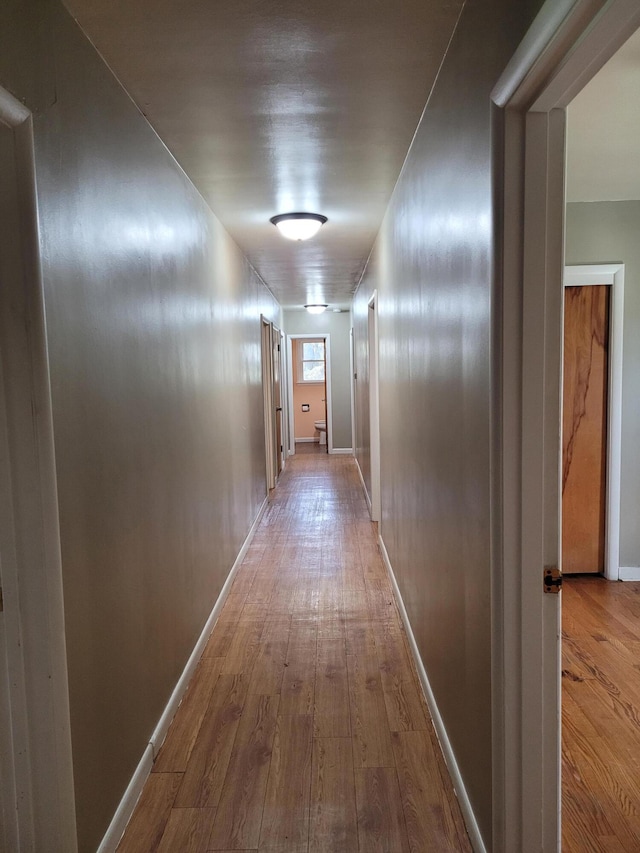 hallway featuring light wood-type flooring