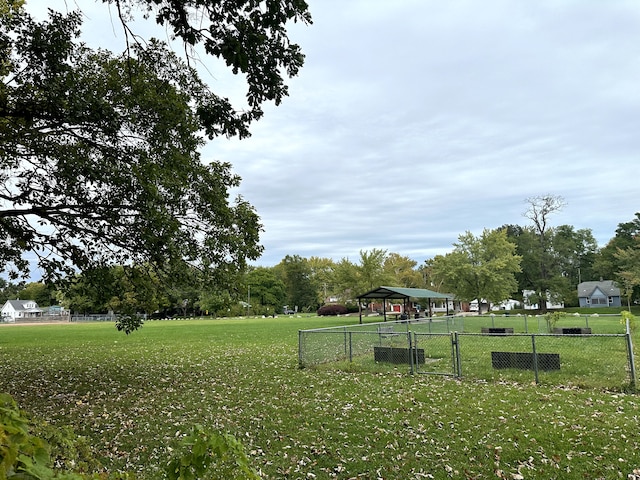 view of home's community with a gazebo and a yard