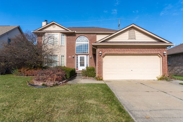 front of property featuring a front yard and a garage