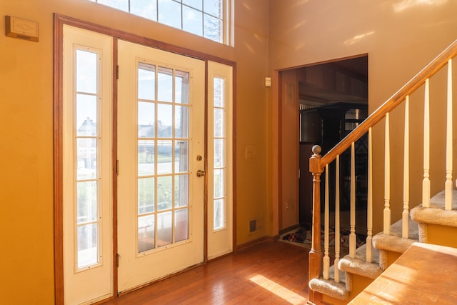 foyer with hardwood / wood-style flooring