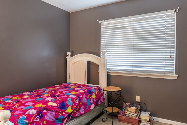 bedroom featuring carpet