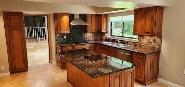 kitchen with stainless steel dishwasher, black electric cooktop, sink, wall chimney range hood, and a kitchen island